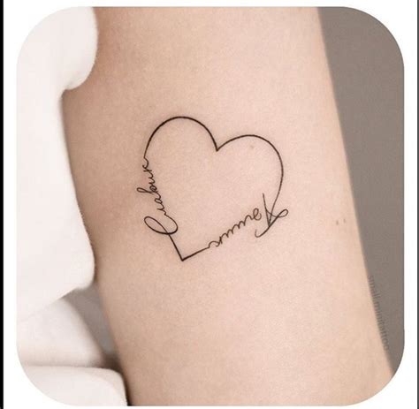 name tattoo in shape of heart